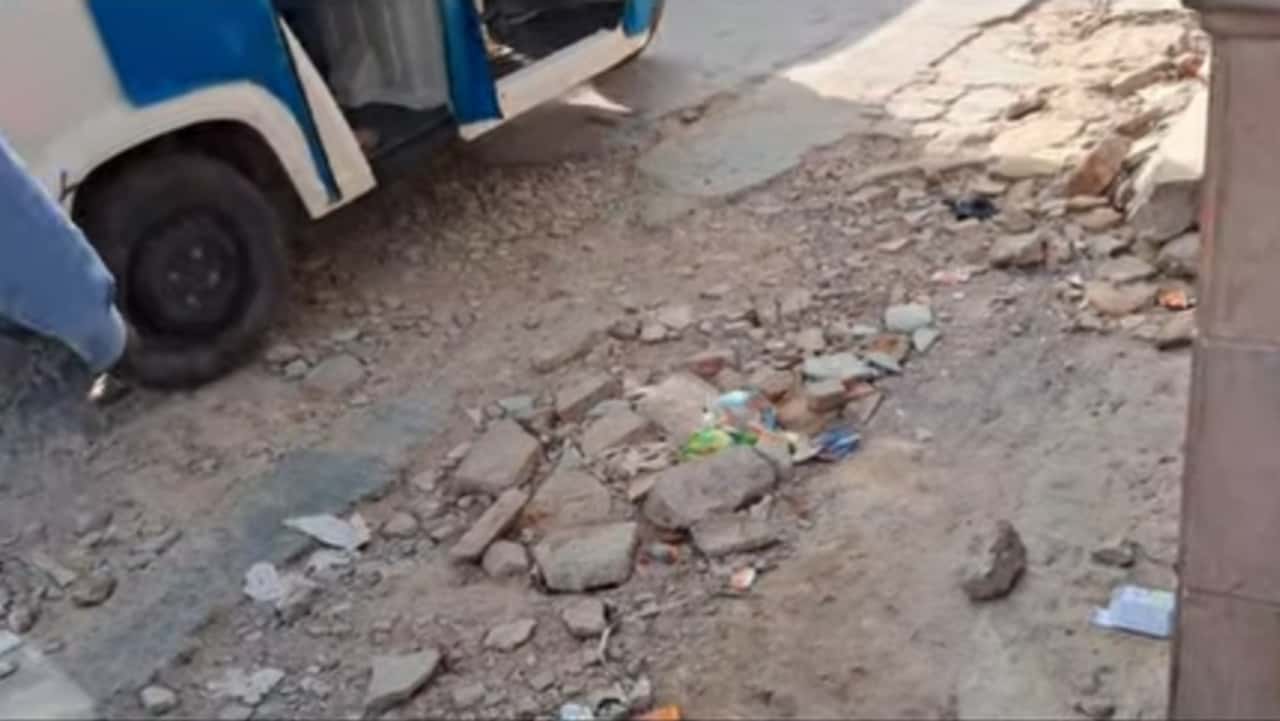Pothole-ridden road near Tal Maidan Sardarsahar causing ambulance delays and public suffering"